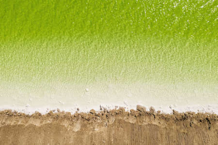 The green saline lake, natural lake background. Photo in Qinghai, China.の写真素材