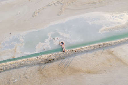 Salt lake with wide flatlands background. Photo in Qinghai, China.