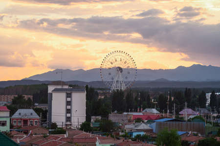 The cityscape at dusk. Shot in Turks Bagua City, Xinjiang, China.の写真素材