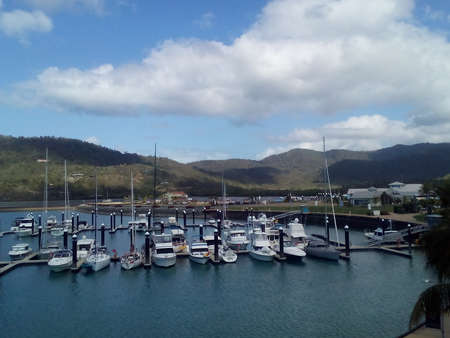 The houseboat is anchored at the dock,Whitsunday Island,Austriaのeditorial素材