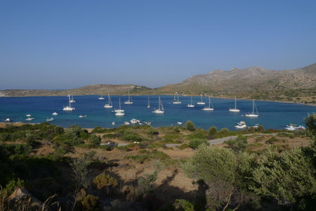 Sailing boats in the bay of the island of Leros in Greeceの写真素材