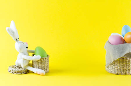 easter eggs in rustic basketの写真素材