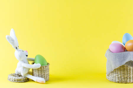 easter eggs in rustic basketの写真素材