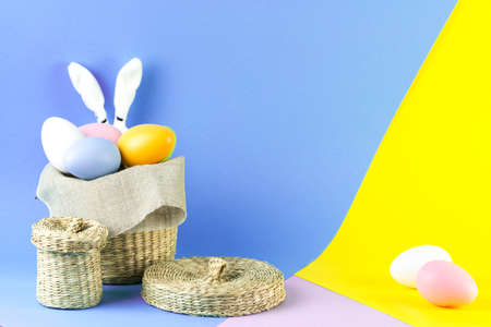 easter eggs in rustic basketの写真素材