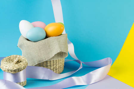 easter eggs in rustic basketの写真素材