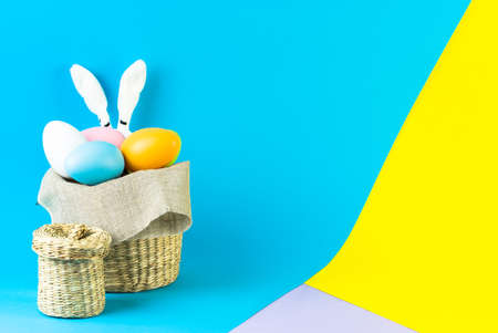 easter eggs in rustic basketの写真素材