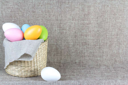 easter eggs in rustic basketの写真素材