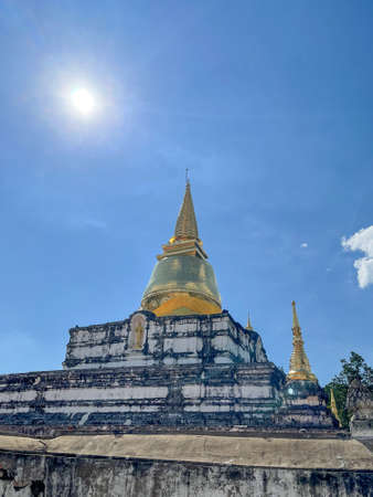 temple or holy place Buddhism There is a golden pagoda with a base with beautiful architecture.