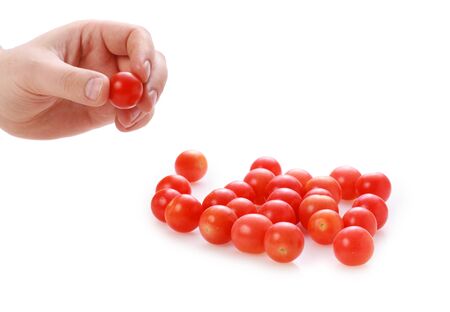 Tomato isolated over white background.の写真素材