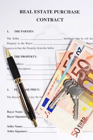 Signing a contract to purchase real estate の写真素材