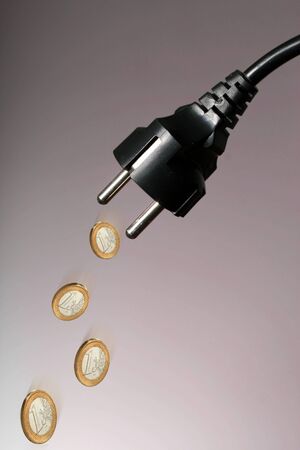 Electricity connector and euro coins の写真素材