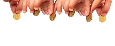 Hands with coins isolated over white.の写真素材