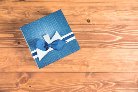 beautiful gift box on a wooden tableの写真素材
