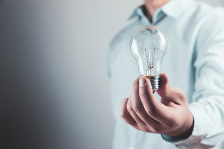 light bulb in hand new idea
