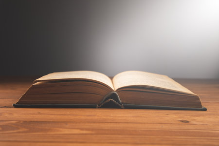 book on the table on a dark background