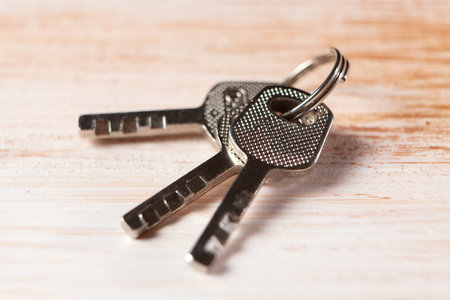 small keys on a wooden table