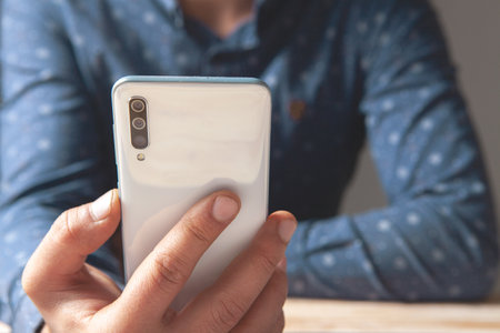a man holding a phone