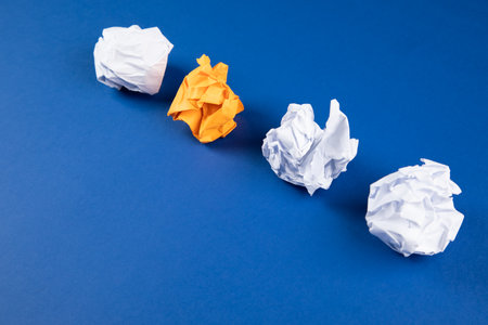 wad of papers on a blue backgroundの写真素材