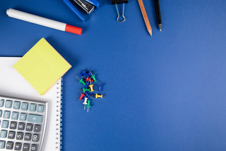 school supplies on the blue table