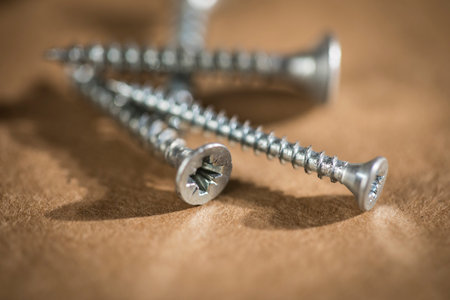 screws on the table on the macro lensの写真素材