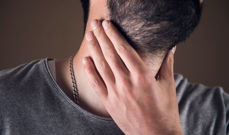 the man has a sore throatの写真素材