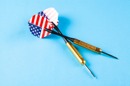 darts on a blue backgroundの写真素材