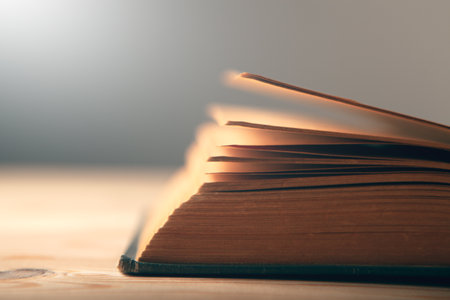 open book on a wooden tableの写真素材
