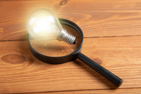 light bulb and magnifying glass search ideaの写真素材