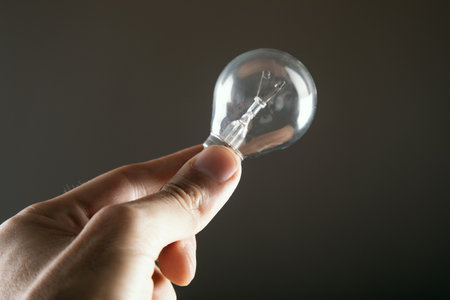 light bulb in hand new idea