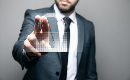 businessman presses the virtual padlock