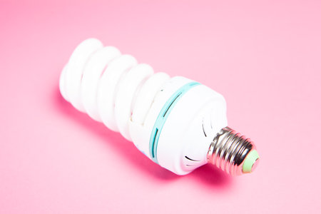 energy-saving gas lamp on pink background