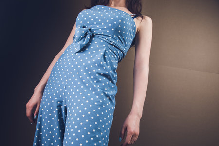young woman posing in dressの写真素材