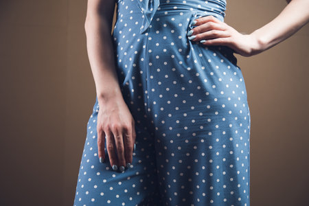 young woman posing in dressの写真素材