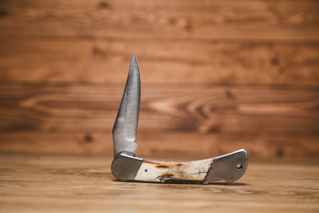 pocket knife on the tableの写真素材