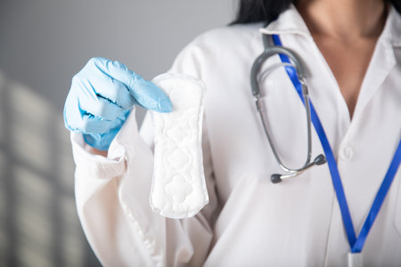 the doctor holds a period padの写真素材