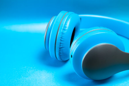big headphones on a blue backgroundの写真素材