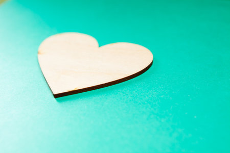 wooden heart on a blue background