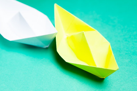 paper boats on a blue backgroundの写真素材