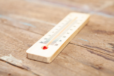 home thermometer on a wooden tableの写真素材