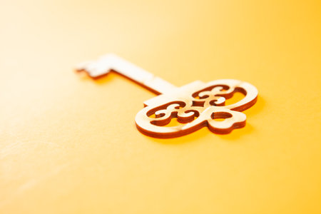 wooden keys on orange backgroundの写真素材