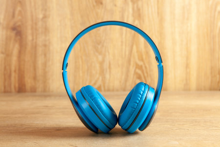 big headphones on wooden backgroundの写真素材