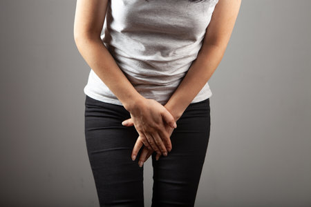 woman holding hands by the ovaryの写真素材