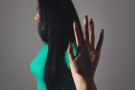 woman showing stop with her handの写真素材