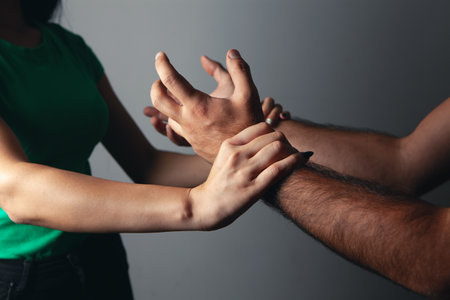 domestic violence. husband wants to hit his wifeの写真素材