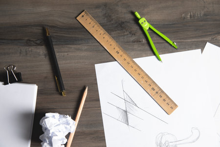 on the table a caliper, ruler and pencilの写真素材