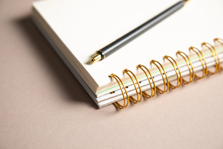 notebook and pen on the table
