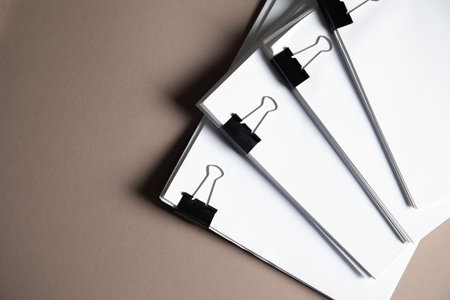 a pile of papers attached to a clip