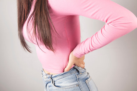 a young woman has a kidney pain