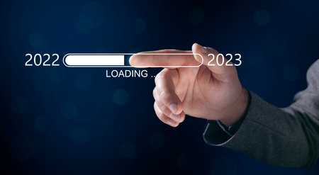 man tapping on virtual screen on bokeh background