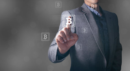 clicks on the bitcoin in the chip.の写真素材